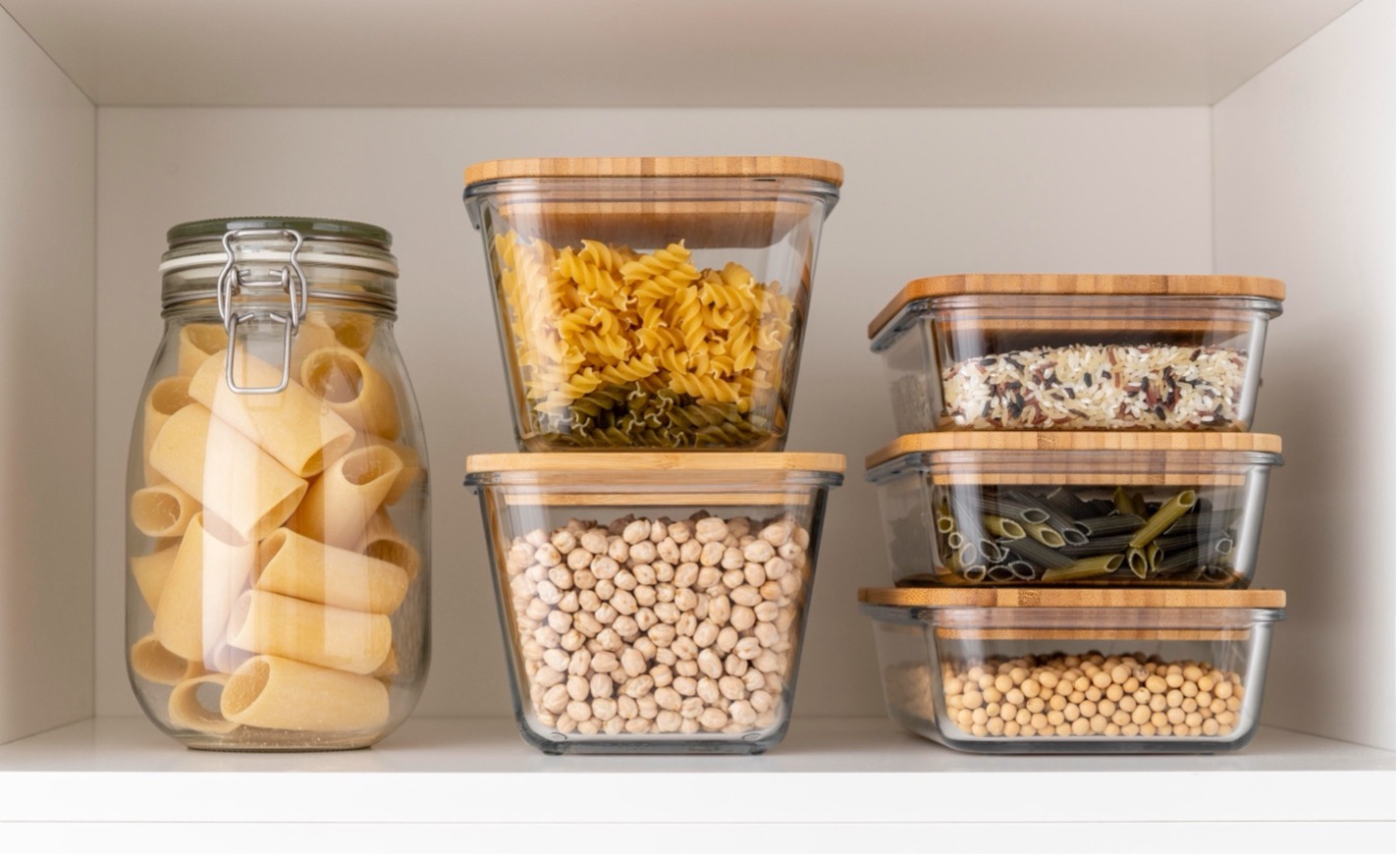 jars of assorted food in glass jars showcasing an alternative to plastic packaging to reduce microplastic use