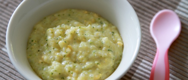 Eggs mashed up and mixed in with vegetable puree for a baby to try.
