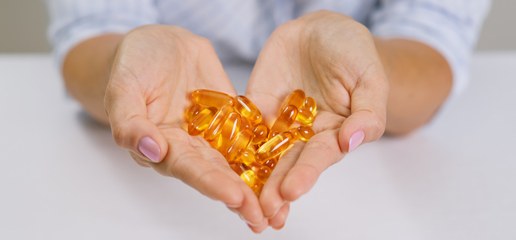 A handful of fish oil supplements taken because of the health benefits of fish oil